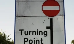 A sign that says turning point 