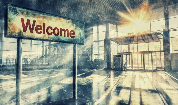a sign that says welcome