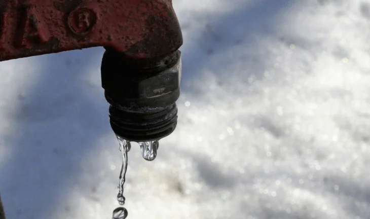 leaking tap with ice
