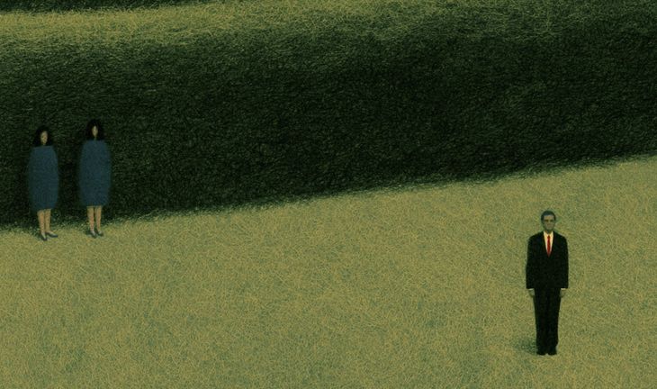 a man and some people by a hedge 